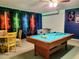 Game room with pool table and foosball table at 8515 Sunrise Key Dr, Kissimmee, FL 34747