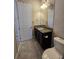 Bathroom with double vanity and granite countertop at 9121 Laureate Blvd, Orlando, FL 32827