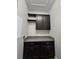 Bright laundry room with washer, dryer, and cabinets at 9121 Laureate Blvd, Orlando, FL 32827