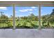 Spacious balcony overlooking a lush golf course at 9512 Tavistock Rd, Orlando, FL 32827