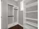 Spacious closet with double rods and shelving at 9512 Tavistock Rd, Orlando, FL 32827