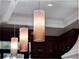 Modern kitchen features three glass pendant lights at 9512 Tavistock Rd, Orlando, FL 32827