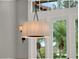 Elegant light fixture perfect for a dining room or kitchen at 9512 Tavistock Rd, Orlando, FL 32827