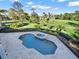 Private pool and spa with expansive golf course views at 9512 Tavistock Rd, Orlando, FL 32827