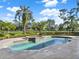 Stunning pool and spa overlooking a golf course at 9512 Tavistock Rd, Orlando, FL 32827