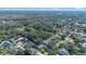 Aerial view of a residential neighborhood showcasing numerous homes and lush green landscape at 960 Manchester Ave, Oviedo, FL 32765