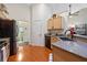 Modern kitchen featuring granite countertops and black stainless steel appliances at 960 Manchester Ave, Oviedo, FL 32765