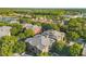 Aerial view of condo community near a lake and shopping at 102 Vista Verdi Cir # 320, Lake Mary, FL 32746