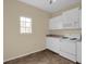 White kitchen with stainless steel appliances at 102 Vista Verdi Cir # 320, Lake Mary, FL 32746