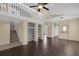 Spacious living room with loft and dark floors at 102 Vista Verdi Cir # 320, Lake Mary, FL 32746