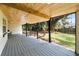 Long covered back porch overlooking backyard at 1025 Early Ave, Winter Park, FL 32789