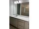 Bathroom with vanity, large mirror, and neutral color scheme at 11141 Green Citron Aly, Winter Garden, FL 34787