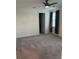 Spacious bedroom with gray carpeting and ceiling fan at 11141 Green Citron Aly, Winter Garden, FL 34787