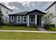 Gray house with white columns and landscaping at 11141 Green Citron Aly, Winter Garden, FL 34787