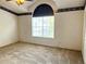 Spacious bedroom with large window and neutral carpeting at 12107 Bruceton Way # 102, Orlando, FL 32828