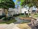 Landscaped courtyard with walking paths and benches at 12107 Bruceton Way # 102, Orlando, FL 32828