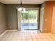 Bright dining area with sliding glass doors leading to a screened patio at 12107 Bruceton Way # 102, Orlando, FL 32828