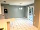 Bright dining area with sliding glass doors to patio at 12107 Bruceton Way # 102, Orlando, FL 32828