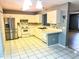 Kitchen with stainless steel appliances and white cabinets at 12107 Bruceton Way # 102, Orlando, FL 32828