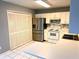 Kitchen featuring stainless steel appliances and white cabinets at 12107 Bruceton Way # 102, Orlando, FL 32828