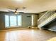 Living area with tile floors, staircase and ceiling fan at 12107 Bruceton Way # 102, Orlando, FL 32828