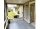 Screened patio with view of backyard and AC unit at 12107 Bruceton Way # 102, Orlando, FL 32828