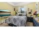 Bedroom with a Queen size bed, television, and a night stand at 1211 Stonecutter Dr # 206, Celebration, FL 34747