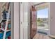 The entryway is illuminated with natural light streaming through the open door, showcasing the home's inviting ambiance at 1211 Stonecutter Dr # 206, Celebration, FL 34747