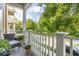 Private balcony overlooking a tree-lined street at 1211 Stonecutter Dr # 206, Celebration, FL 34747