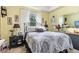 Cozy bedroom with a comfortable bed and nightstand at 1211 Stonecutter Dr # 206, Celebration, FL 34747