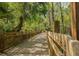 Nature trail with wooden boardwalk and lush foliage at 1211 Stonecutter Dr # 206, Celebration, FL 34747