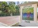 Artisan Park community entrance with mosaic tree artwork at 1211 Stonecutter Dr # 206, Celebration, FL 34747