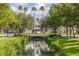 Quaint community entrance with a water feature and classic architecture at 1211 Stonecutter Dr # 206, Celebration, FL 34747