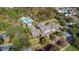 Aerial view of community pool, clubhouse, and surrounding area at 1211 Stonecutter Dr # 206, Celebration, FL 34747