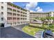 Condo building with parking and landscaping at 1211 Stonecutter Dr # 206, Celebration, FL 34747