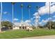 Charming golf clubhouse with a vintage car and windmill at 1211 Stonecutter Dr # 206, Celebration, FL 34747