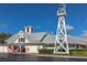 Picturesque golf clubhouse with a tall windmill at 1211 Stonecutter Dr # 206, Celebration, FL 34747