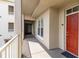 Building hallway with access to condo unit at 1211 Stonecutter Dr # 206, Celebration, FL 34747