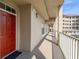 Building hallway with access to condo unit at 1211 Stonecutter Dr # 206, Celebration, FL 34747