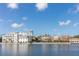 Picturesque view of lakefront buildings and a charming townscape at 1211 Stonecutter Dr # 206, Celebration, FL 34747