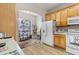 Bright pantry offers lots of shelving for storage needs at 1211 Stonecutter Dr # 206, Celebration, FL 34747