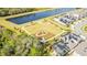Aerial view of community with playground and lake at 12754 Brodlove Ln, Winter Garden, FL 34787