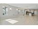 Open concept living room with hardwood floors and kitchen views at 12754 Brodlove Ln, Winter Garden, FL 34787