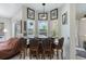 Cozy dining area offers a view of the pool and lots of natural light at 14101 Vista Del Lago Blvd, Clermont, FL 34711