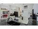 Kitchen showcasing granite countertops, ample cabinet space, and access to a dining room at 14101 Vista Del Lago Blvd, Clermont, FL 34711