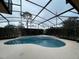 Inviting kidney-shaped pool with spa at 14101 Vista Del Lago Blvd, Clermont, FL 34711