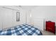 Bedroom with a double bed, dresser, and large closet at 1490 Woodmont Blvd, Kissimmee, FL 34746
