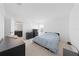 Bright bedroom with carpeted floor, dresser, and window at 1490 Woodmont Blvd, Kissimmee, FL 34746