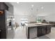 Modern kitchen with stainless steel appliances and granite countertops at 1490 Woodmont Blvd, Kissimmee, FL 34746