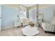 Charming Bedroom with a crib and comfortable seating at 1542 Wax Myrtle Way, Haines City, FL 33844